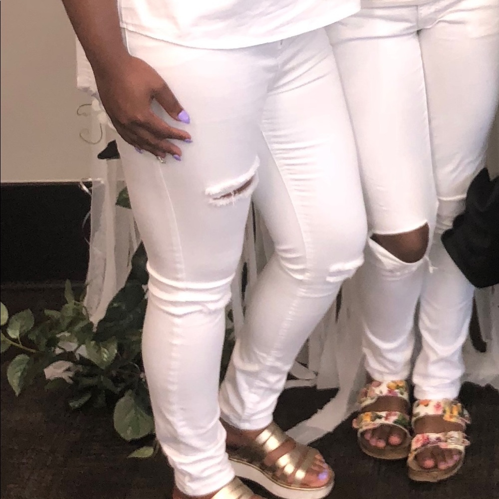 White distressed skinny and stretch jeans